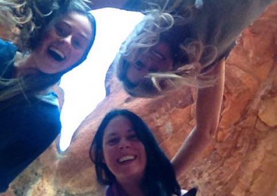 3 women at the birthing cave in sedona